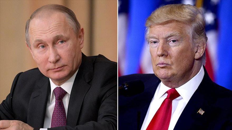 El presidente de EE.UU., Donald Trump (dcha.) y su homólogo ruso, Vladimir Putin.