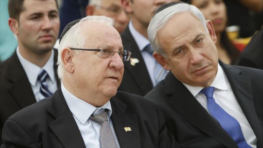 El presidente israelí, Reuven Rivlin (izda.), y el primer ministro de ese régimen, Benyamin Netanyahu.
