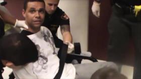 Policía de EEUU disparó por la espalda a joven negro