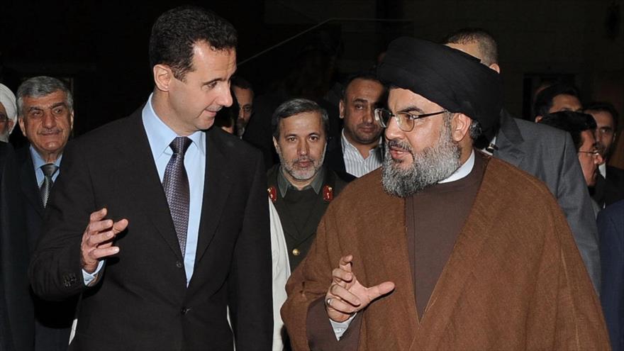 El presidente de Siria, Bashar al-Asad, y el secretario general del Movimiento de la Resistencia Islámica de El Líbano (Hezbolá), Seyed Hasan Nasrolá, durante una reunión.