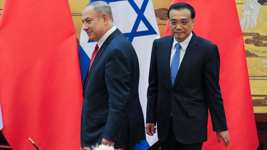 El primer ministro del régimen de Israel, Benyamin Netanyahu, junto con su homólogo chino, Li Keqiang, tras una rueda de prensa en Pekín, la capital china, 20 de marzo de 2017.