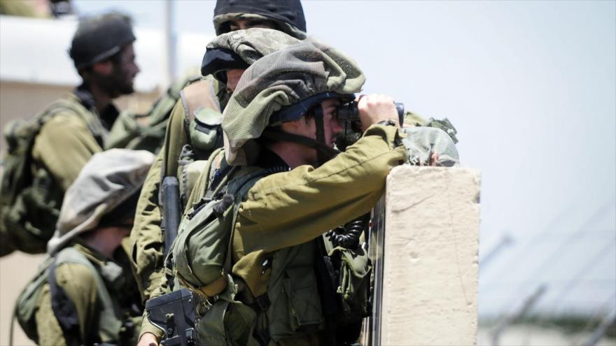 Fuerzas de guerra israelíes (IDF, en inglés) cerca de la frontera entre los territorios ocupados palestinos y Siria.