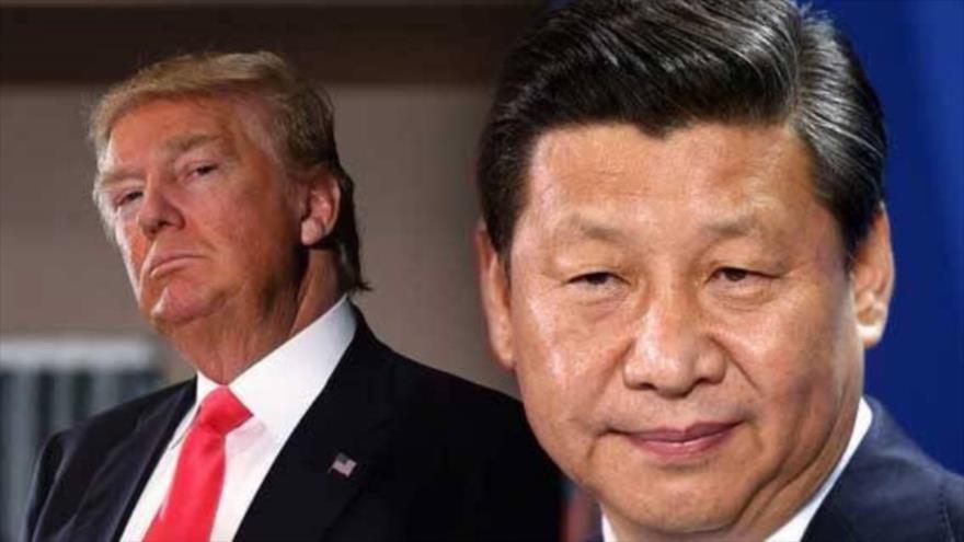 El presidente de China, Xi Jinping (dcha.), y su par estadounidense, Donald Trump.