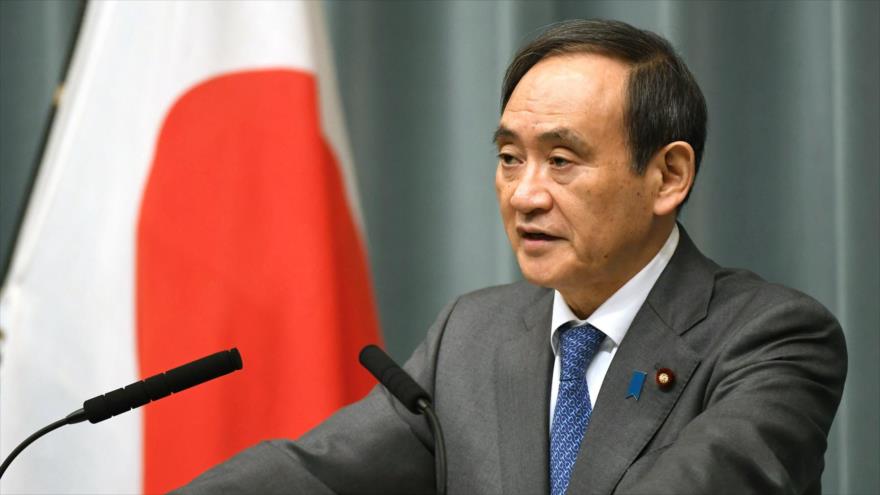El ministro portavoz del Ejecutivo, Yoshihide Suga, en una conferencia de prensa celebrada en Tokio (capital), 27 de enero de 2015.