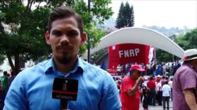 Trabajadores hondureños conmemoran su día en una masiva marcha