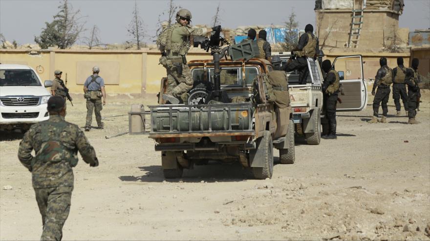 Las fuerzas especiales de EE.UU. y las Fuerzas Democráticas Sirias durante una operación militar en el norte de Siria, 25 de mayo de 2016.
