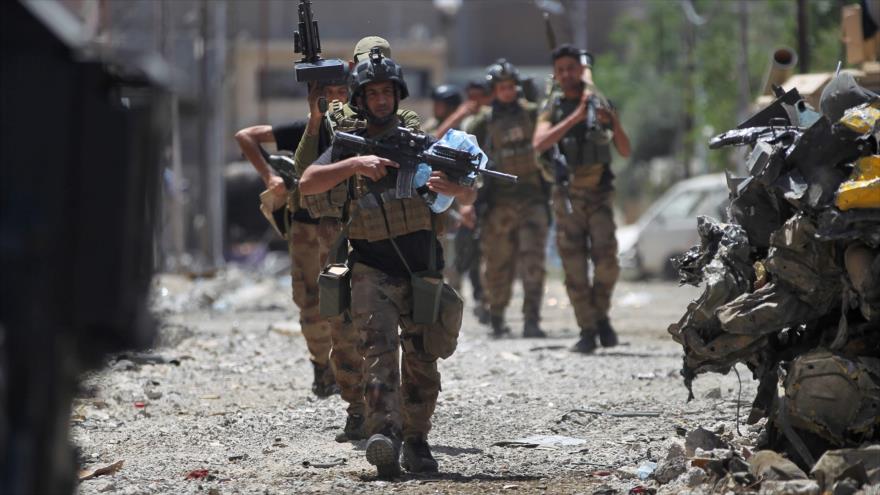 Integrantes de las fuerzas de seguridad iraquíes en el oeste de Mosul, 12 de mayo de 2017.