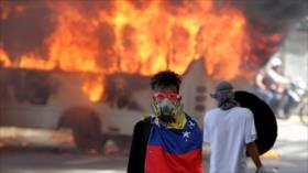 Francotirador dispara a policía en marchas opositoras en Venezuela