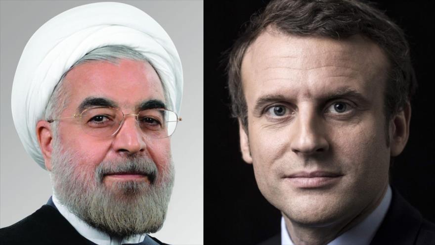 El presidente de Irán, Hasan Rohani (izda.) y su homólogo francés, Emmanuel Macron.