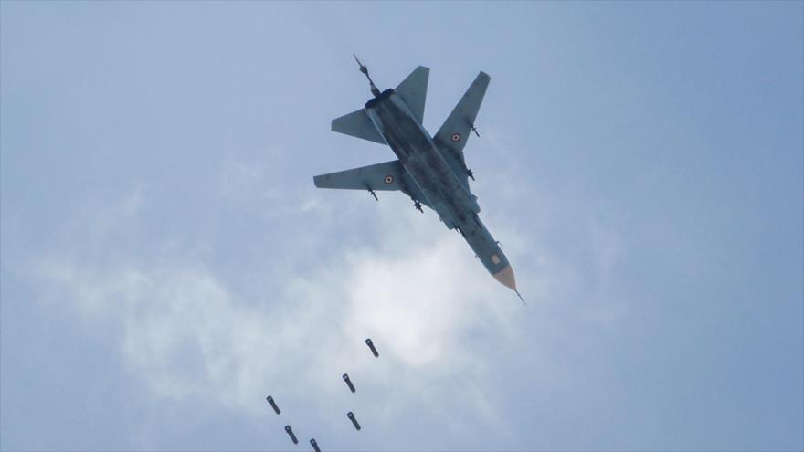 Un caza MiG-23 del Ejército sirio durante una operación antiterrorista en la parte oriental de Damasco (capital), 6 de mayo de 2017.