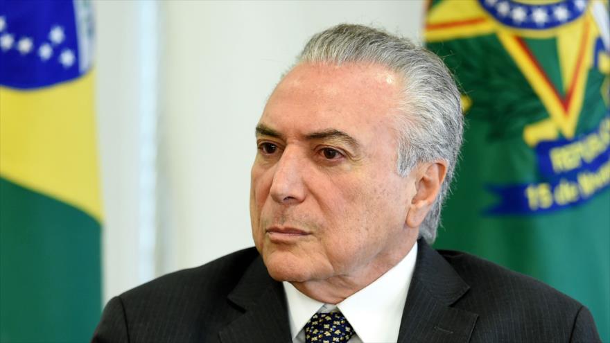 El presidente brasileño, Michel Temer, acude a una reunión con empresarios en el Palacio del Planalto, Brasilia, 25 de mayo de 2017.