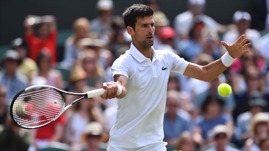 Djokovic y Federer pasan a la segunda ronda en Wimbledon