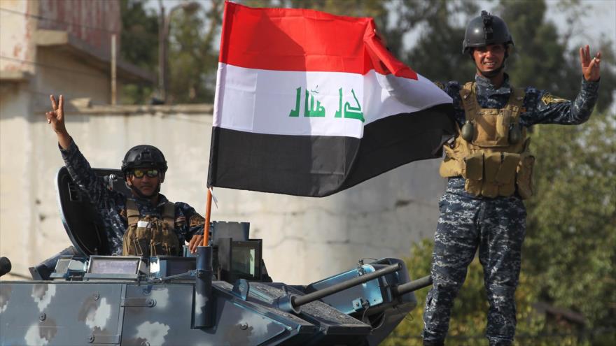 Fuerzas iraquíes celebran su victoria en Mosul, 9 de julio de 2017.