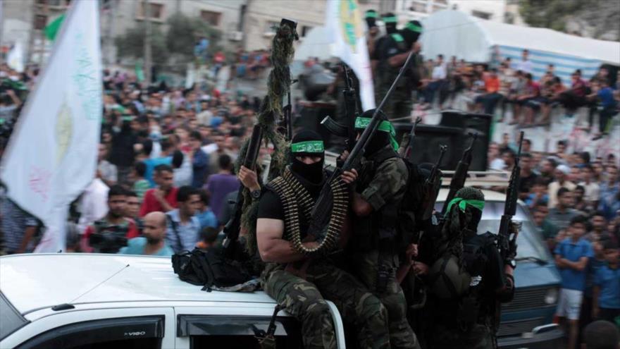 Combatientes de las Brigadas de Ezzedin Al-Qassam, brazo armado de HAMAS, en un desfile militar en Gaza.
