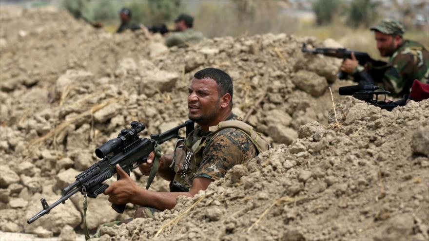 Combatientes de la Movilización Popular de Irak (Al-Hashad Al-Shabi, en árabe) en una operación contra el grupo terrorista Daesh en Irak.