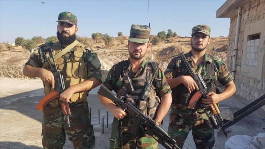 Miembros del Ejército sirio cerca de la ciudad de Al-Raqa, 21 de julio de 2017.