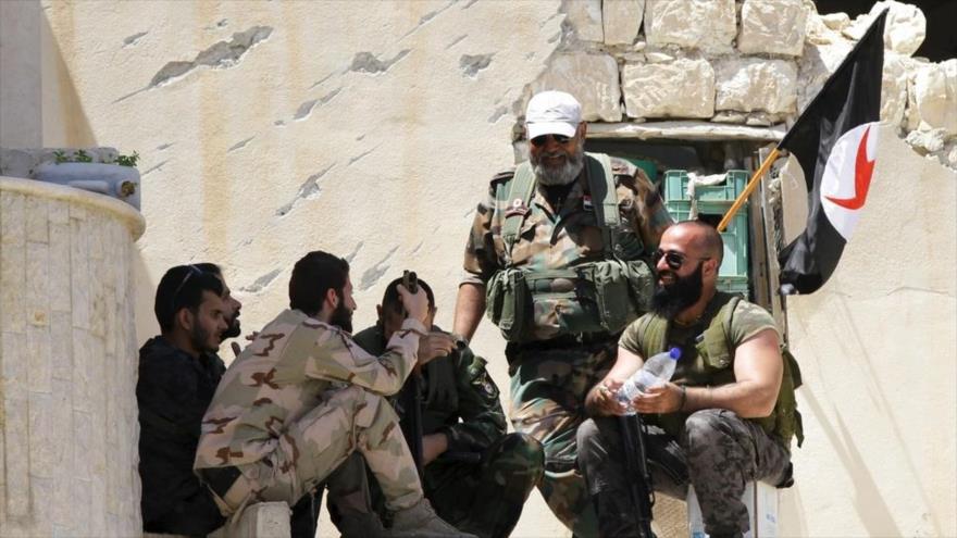 Integrantes del Partido Nacionalista Social Sirio (SSNP, por sus siglas en inglés), que luchan junto con el Ejército sirio.