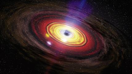Descubren un agujero negro 100.000 veces más grande que el Sol 