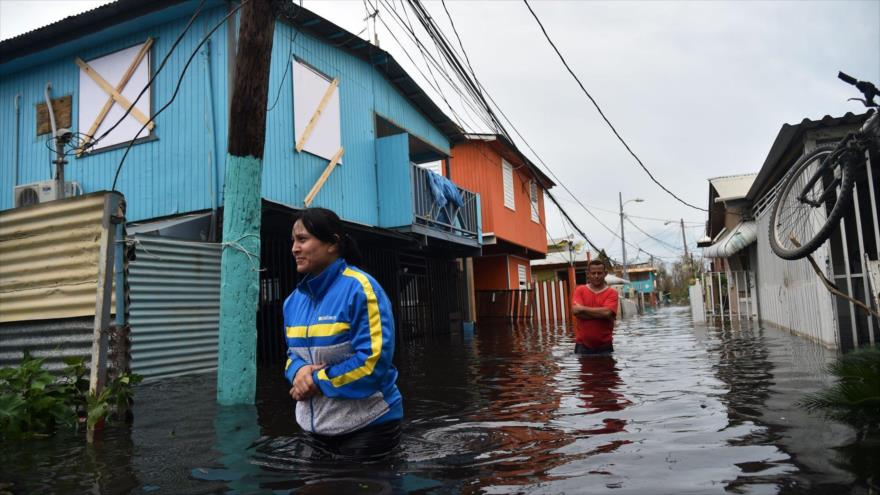 Una calle inundada en Puerto Rico tras el paso del huracán María, 21 de septiembre de 2017.