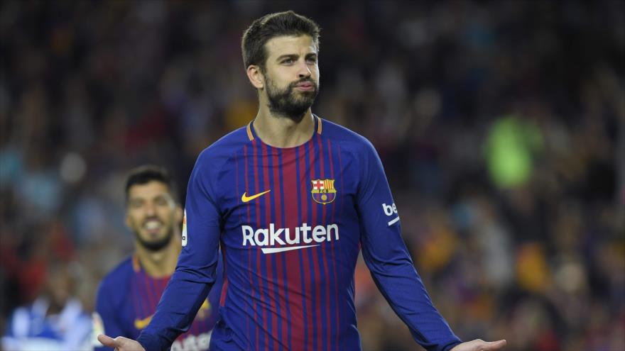 El central del FC Barcelona, Gerard Piqué, celebra tras anotar un gol ante Espanyol, 9 de septiembre de 2017.