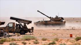 Vea avance de tropas sirias contra EIIL cruzando el río Éufrates