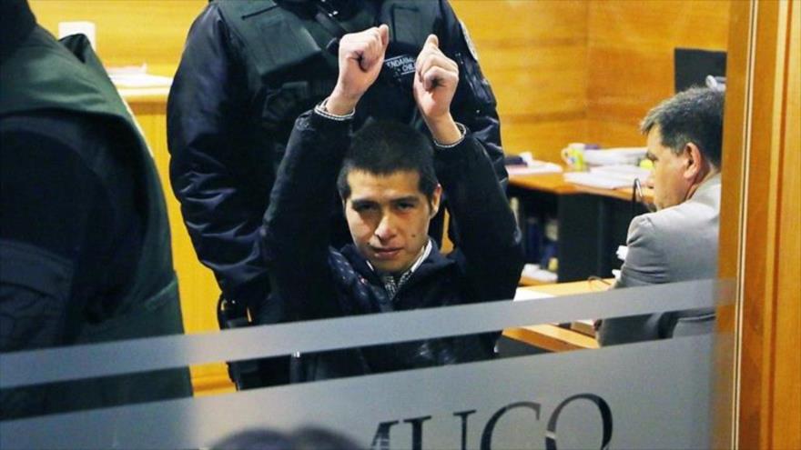 En la foto uno de los cuatro comuneros mapuches que lleva quince meses en prisión preventiva sin juicio.