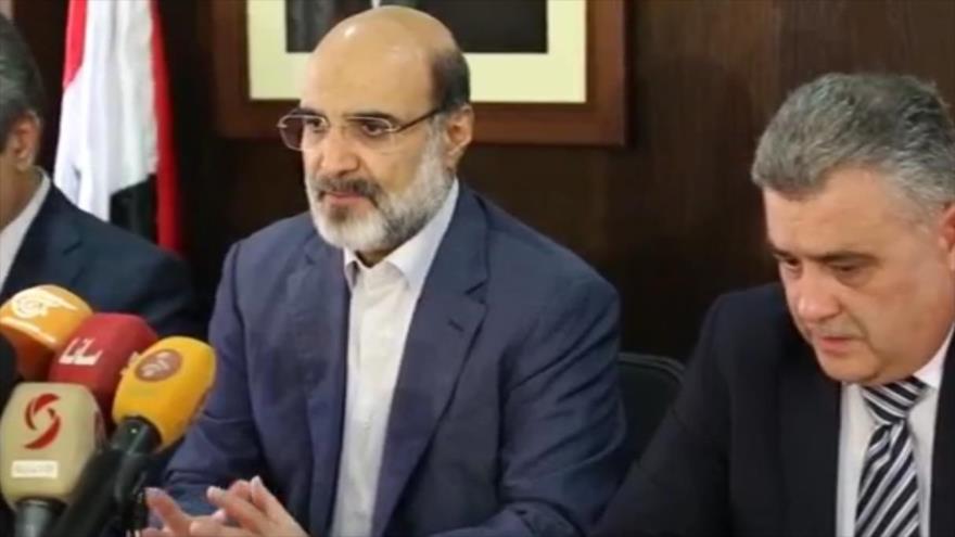 Abdolali Ali Asgari, presidente de IRIB (izda.), se reúne con el ministro sirio de Información en Damasco, 13 de octubre de 2017.