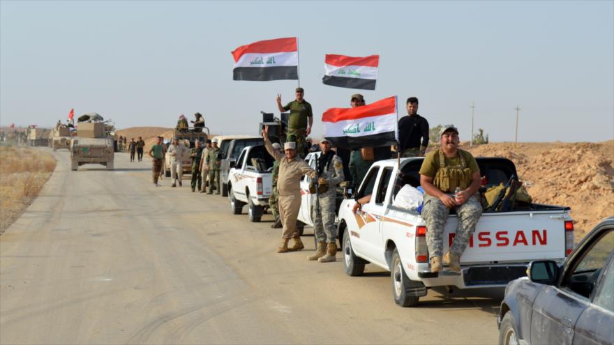 Fuerzas iraquíes se desplazan hacia la localidad de Al-Rayhana en Al-Anbar y fronteriza con Siria, 19 de septiembre de 2017.