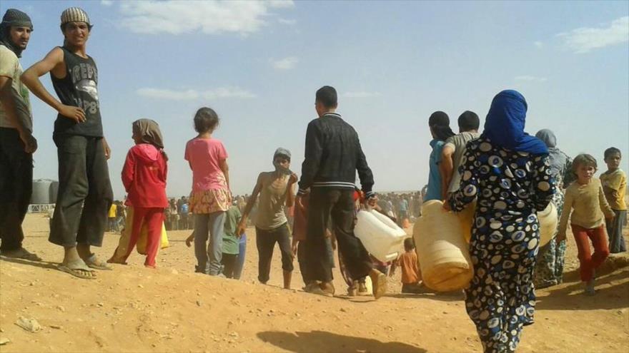 Refugiados sirios en el campo de Al-Rukban en la provincia siria de Homs cerca de la frontera de Jordania.