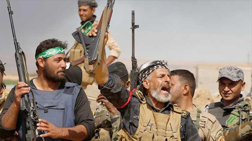 Combatientes de las Unidades de Movilización Popular iraquíes (Al-Hashar Al-Shabi, en árabe) en Tal Afar, norte de Irak.