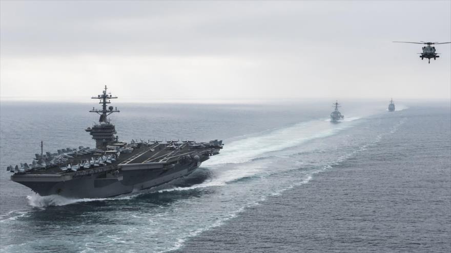 El portaaviones USS Theodore Roosevelt y su grupo de ataque en un ejercicio en el océano Pacífico, 11 de agosto de 2017.