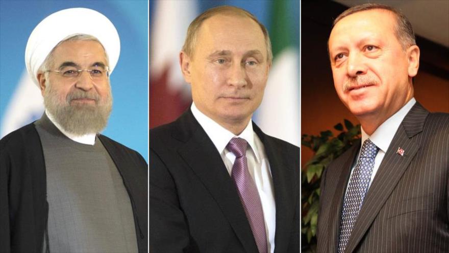 Los presidentes de Irán, Hasan Rohani (izda.); de Rusia, Vladimir Putin (centro) y de Turquía, Recep Tayyip Erdogan.