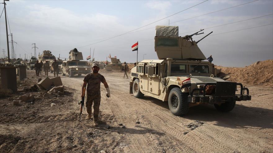 Fuerzas iraquíes se despliegan ceca de la frontera siria después de recuperar la ciudad de Al-Qaem, al oeste de Al-Anbar, 4 de noviembre de 2017.