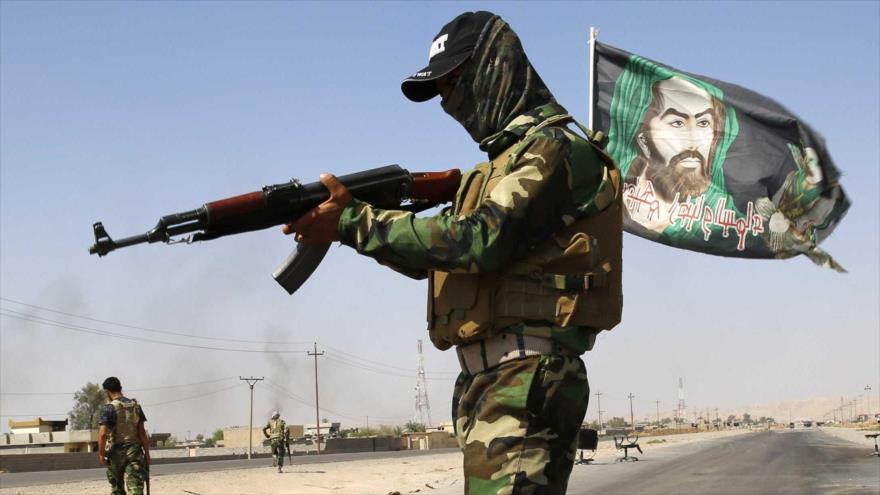 Miembros de las fuerzas populares de Irak desplegados a las afueras de Mosul.