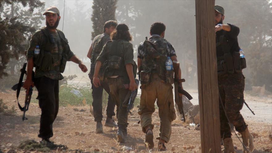 Los integrantes del Frente Al-Nusra (autodenominado Frente Fath Al-Sham) en la ciudad siria de Alepo, agosto de 2016.