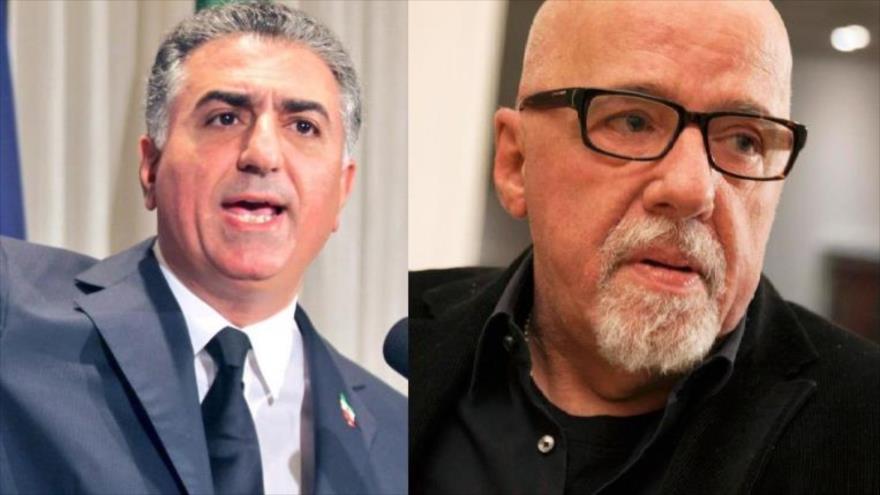 El escritor brasileño, Paulo Coelho, (dcha.) y Reza Pahlavi, el hijo del depuesto Shah de Irán.