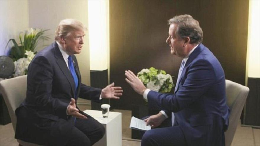 El presidente de Estados Unidos, Donald Trump (izda.), entrevistado por el periodista británico Piers Morgan.