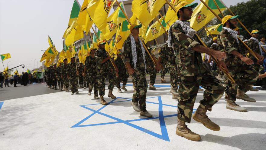 Combatientes del Movimiento de Resistencia Islámica de El Líbano (Hezbolá) en un desfile militar.