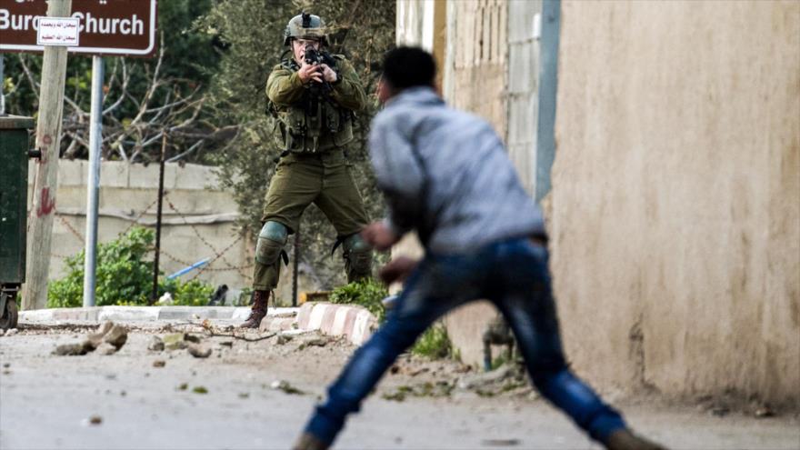Soldados israelíes matan a tiros a joven palestino en Cisjordania | HISPANTV