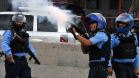Represión de manifestantes opositores deja un muerto en Honduras