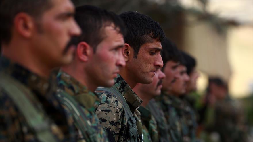 Combatientes de las Unidades de Protección Popular (YPG, por sus siglas en kurdo).