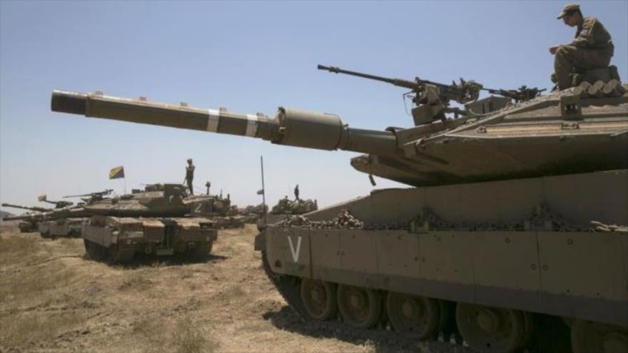 Tanques de combate israelí durante un ejercicio en los altos del Golán, en la frontera con Siria.