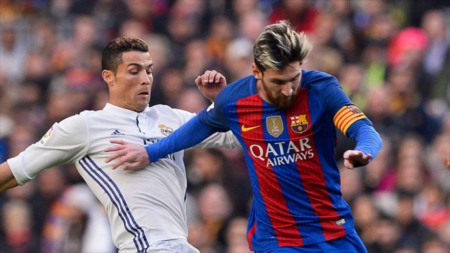 El astro argentino Lionel Messi (dcha.) y estrella portuguesa del Real Madrid C.F. Cristiano Ronaldo.