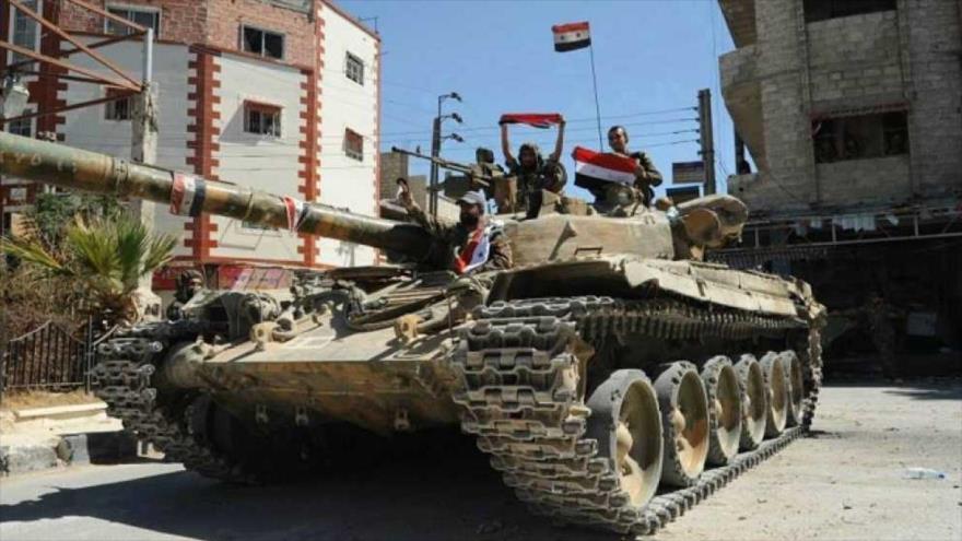 Los soldados sirios celebran victoria del Ejército en Guta Oriental, al este de Damasco.