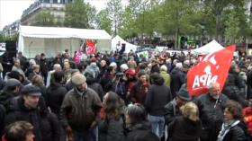 Franceses cansados de políticas de Macron marchan en París