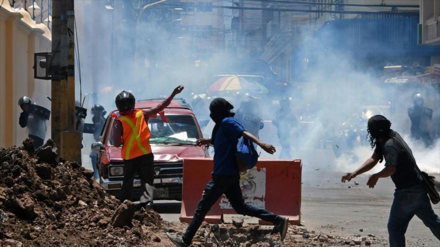 Reprimen las marchas por el Día del Trabajador en Honduras