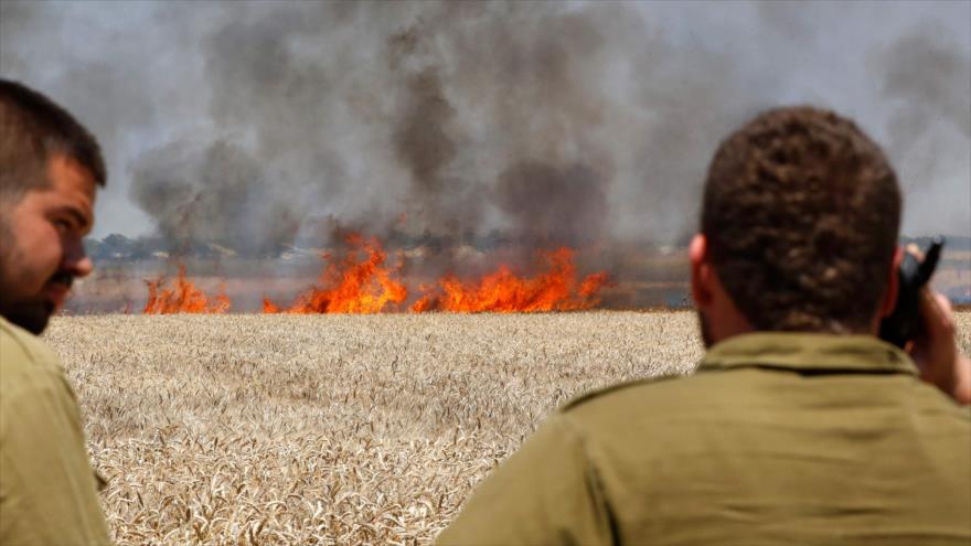 Soldados israelíes desplegados en la frontera entre los territorios ocupados palestinos y la Franja de Gaza, 14 de mayo de 2018.