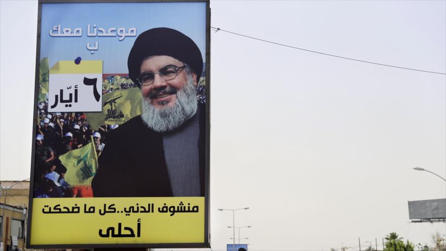 Cartel con foto del secretario general del Movimiento de Resistencia Islámica de El Líbano (Hezbolá), Seyed Hasan Nasralá, en Beirut, 4 de mayo de 2018.