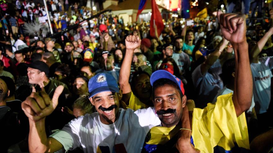 Los partidarios del presidente venezolano, Nicolás Maduro, celebran su victoria en las elecciones presidenciales, 20 de mayo de 2018.