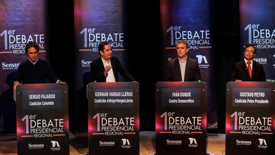 Los candidatos presidenciales de Colombia discuten en el nuevo debate presidencial, a tres días de los comicios, 24 mayo de 2018.